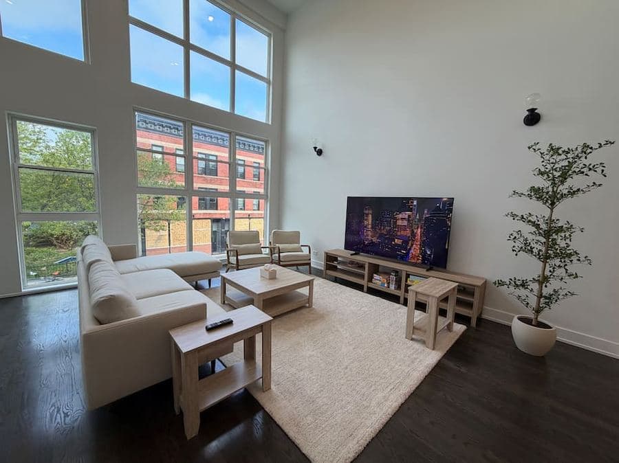 Sun-drenched living room at Pilsen Prism, a 3 bedroom rental in Chicago